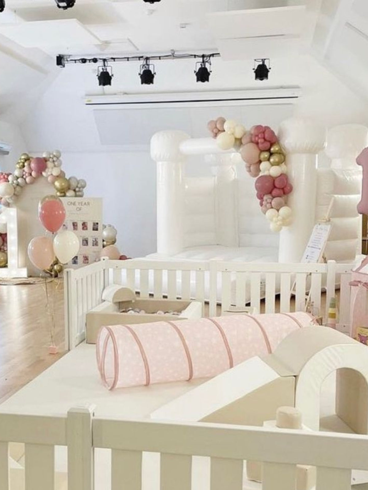 Cozy nursery setup with safe and soft plush toys for infants from Rayne's Baby World