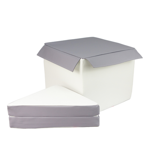 Cube & Triangle soft play pieces with a grey-topped cube and white triangular cushions from Raynes Baby World